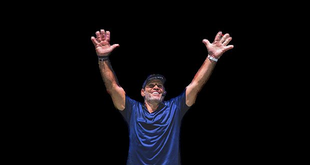 Tony Robbins with arms raised, Unleash the Power Within